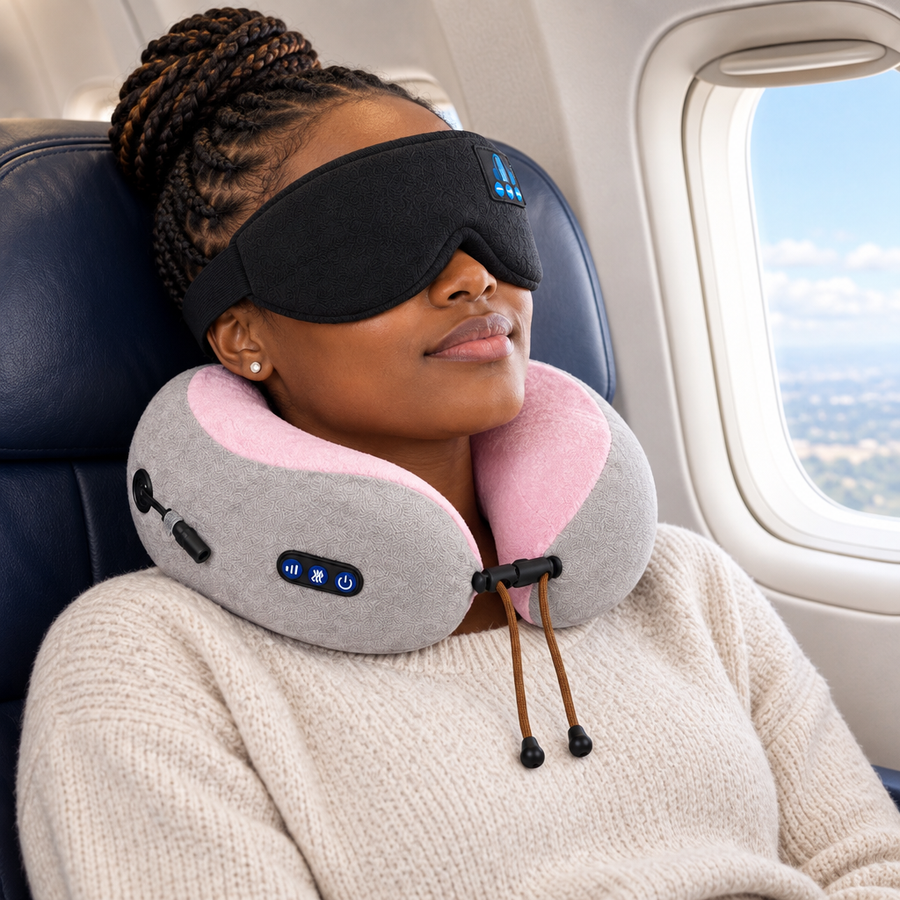 Woman on a flight wearing the Bluetooth sleep mask and massage neck pillow