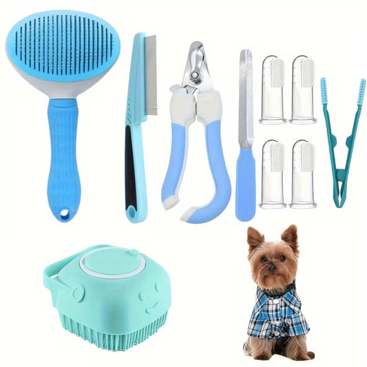 9-in-1 Pet Grooming Kit including slicker brush, flea comb, nail clipper, finger toothbrushes and silicone bath scrubber in blue, shown with a Yorkshire Terrier