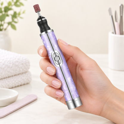 Illustrative image of purple nail polisher held above a manicure table